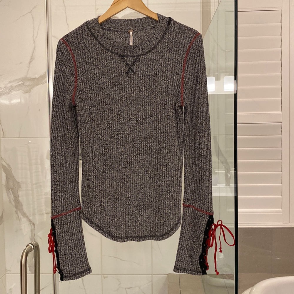 Free People waffle knit long sleeved shirt with lace up cuffs